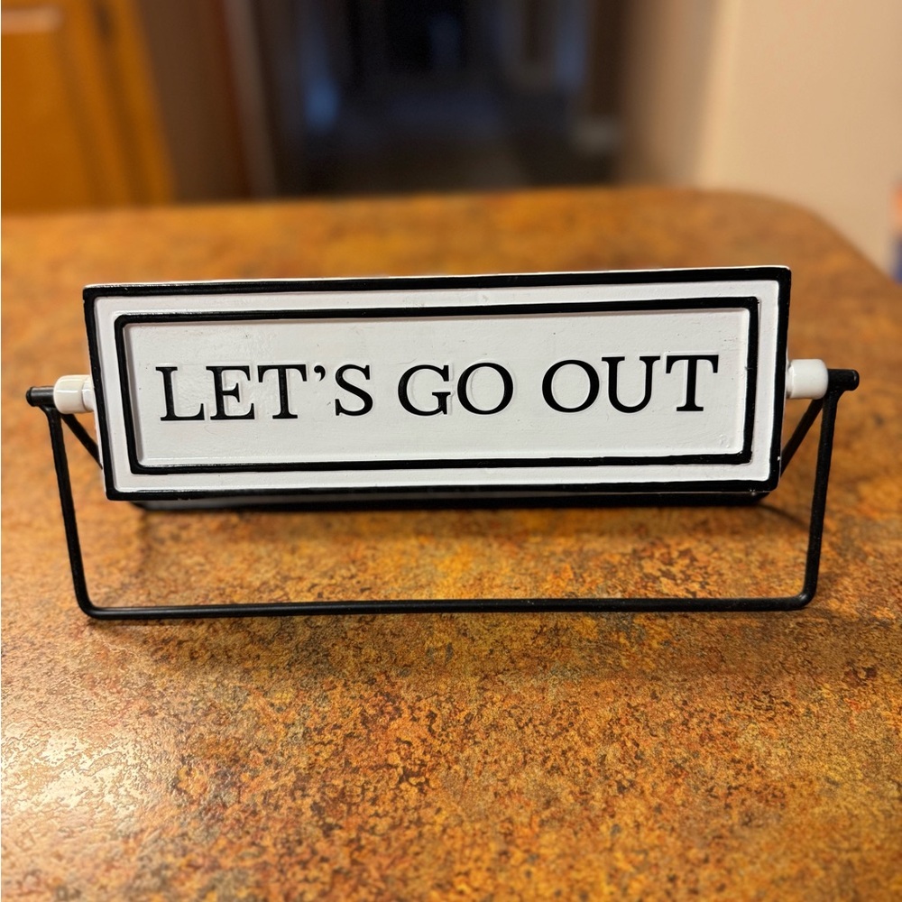 Let’s go out, Let’s stay in. Black and White Decorative Sign
